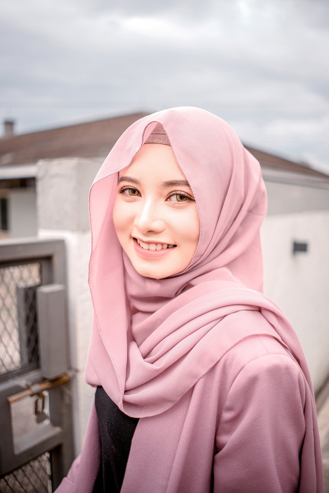 Beautiful Woman in a Pink Hijab Smiling at The Camera